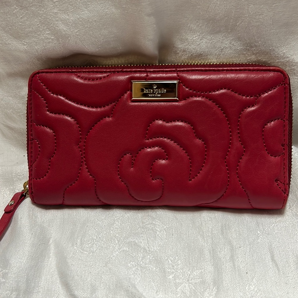 Kate spade red zippy wallet.